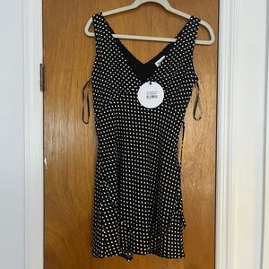 Black polka dot mini dress